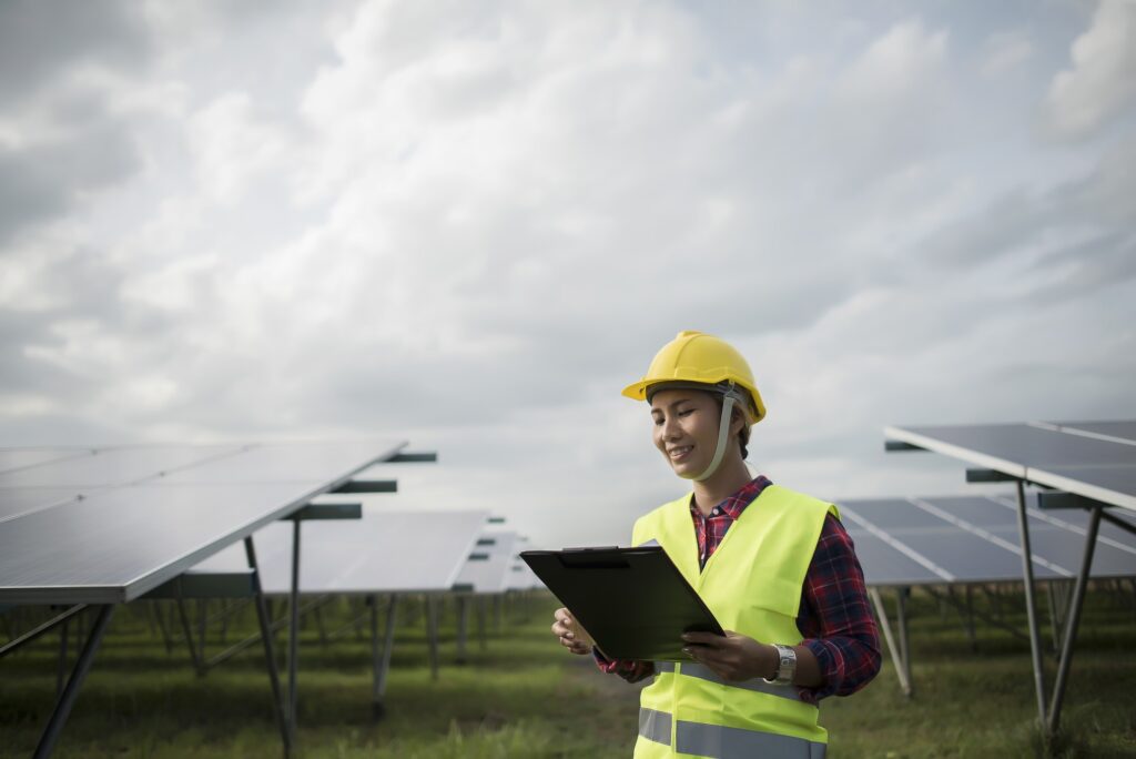 Engineer electric woman checking and maintenance of solar cells  1024x684